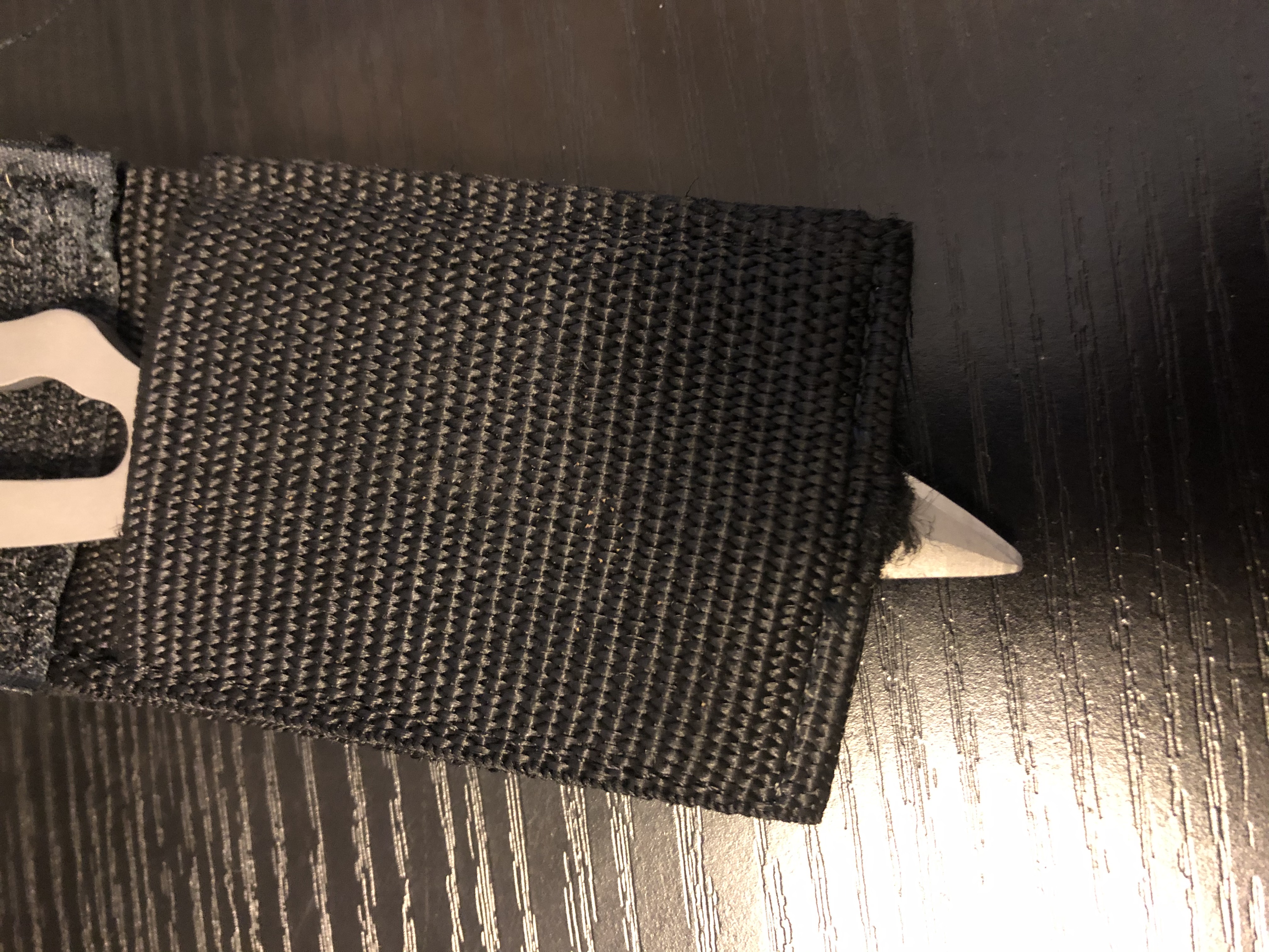 A real photo of DGX Gears Titanium Tek Dive Cutting Tool w/Waistbelt Sheath by Knife is nice but sheath is garbage (1)